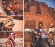 Bride and groom stand with soldiers in front of the Treasury in Petra Jordan before their wedding